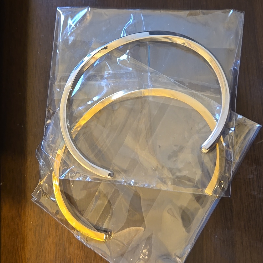 NIB Gold an silver bracelets